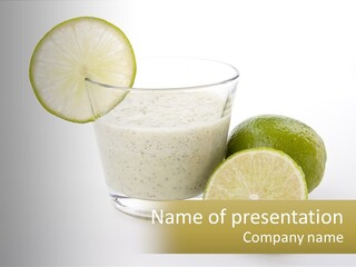 A Glass With A Lime And A Lime Slice Next To It PowerPoint Template