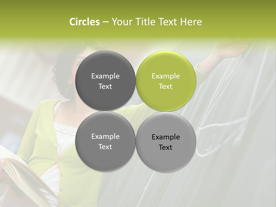 A Woman Writing On A Blackboard In A Classroom PowerPoint Template