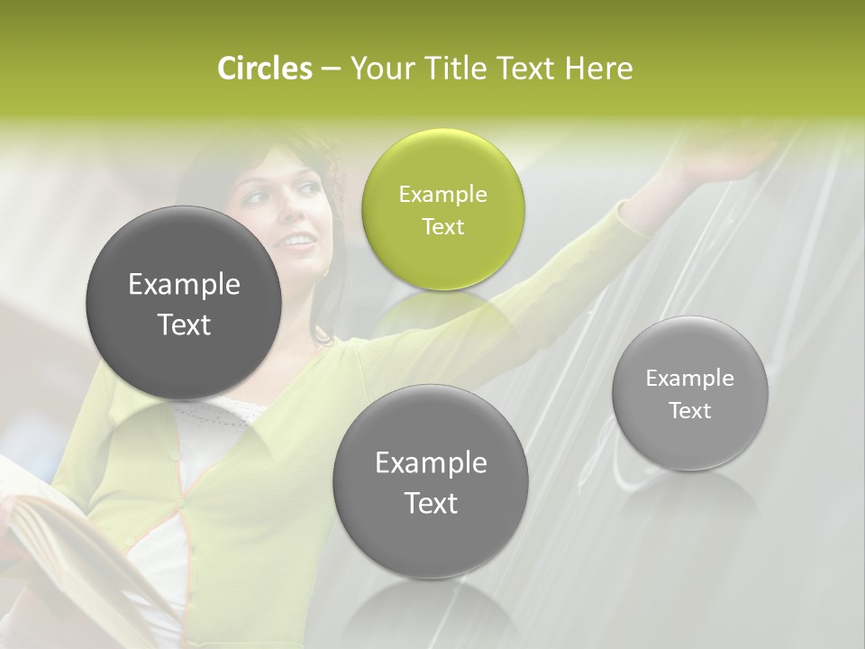 A Woman Writing On A Blackboard In A Classroom PowerPoint Template