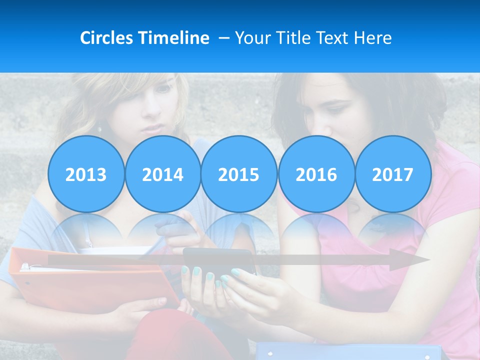 Two Young Women Sitting On Steps Looking At A Tablet PowerPoint Template