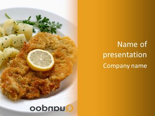 A Plate Of Food With Potatoes And A Lemon On It PowerPoint Template