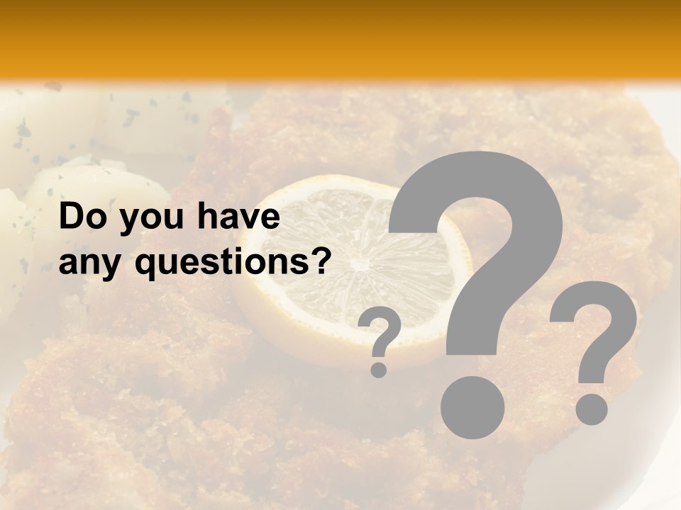 A Plate Of Food With Potatoes And A Lemon On It PowerPoint Template