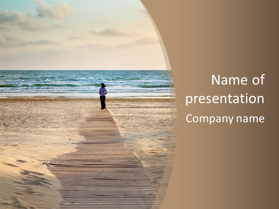 A Person Standing On A Wooden Walkway Near The Ocean PowerPoint Template