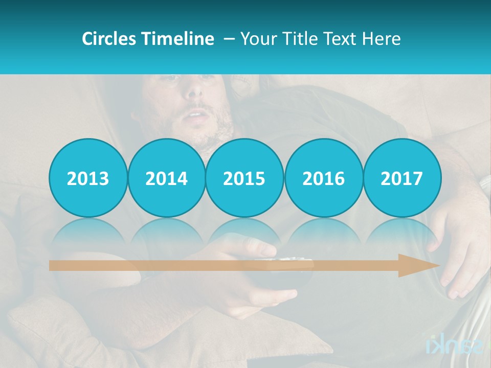 A Man Laying On A Couch Holding A Remote Control PowerPoint Template