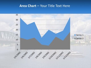 A Bridge Over A River With A Boat In The Water PowerPoint Template