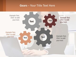 A Woman Sitting At A Desk With A Laptop PowerPoint Template