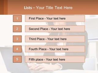 A Woman Sitting At A Desk With A Laptop PowerPoint Template