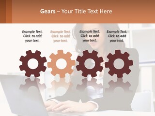 A Woman Sitting At A Desk With A Laptop PowerPoint Template