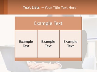 A Woman Sitting At A Desk With A Laptop PowerPoint Template