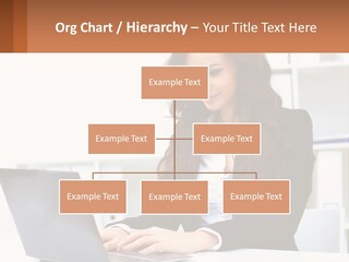 A Woman Sitting At A Desk With A Laptop PowerPoint Template