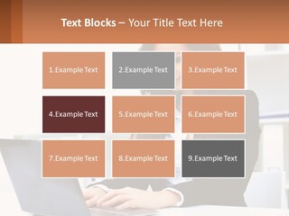 A Woman Sitting At A Desk With A Laptop PowerPoint Template