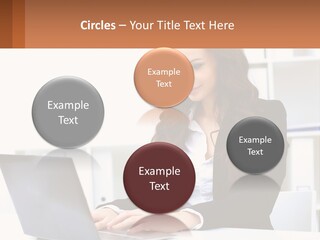 A Woman Sitting At A Desk With A Laptop PowerPoint Template