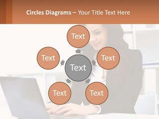 A Woman Sitting At A Desk With A Laptop PowerPoint Template