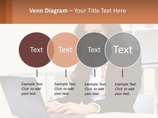 A Woman Sitting At A Desk With A Laptop PowerPoint Template