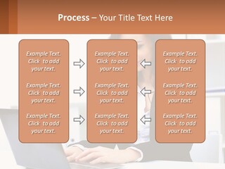 A Woman Sitting At A Desk With A Laptop PowerPoint Template