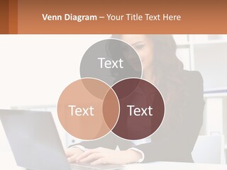 A Woman Sitting At A Desk With A Laptop PowerPoint Template