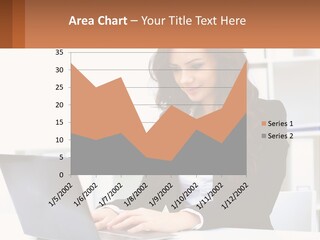 A Woman Sitting At A Desk With A Laptop PowerPoint Template
