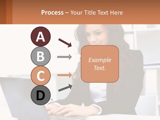 A Woman Sitting At A Desk With A Laptop PowerPoint Template