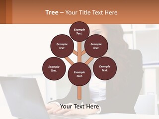 A Woman Sitting At A Desk With A Laptop PowerPoint Template