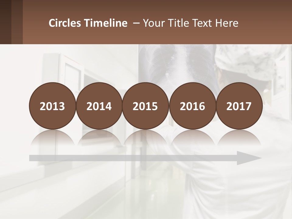 A Woman In A White Lab Coat Is Looking At A X - Ray PowerPoint Template