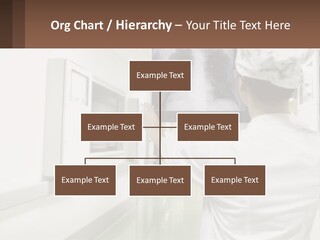 A Woman In A White Lab Coat Is Looking At A X - Ray PowerPoint Template