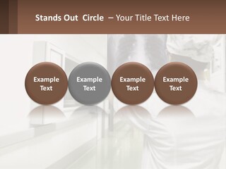 A Woman In A White Lab Coat Is Looking At A X - Ray PowerPoint Template