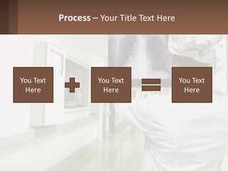 A Woman In A White Lab Coat Is Looking At A X - Ray PowerPoint Template