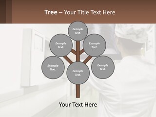 A Woman In A White Lab Coat Is Looking At A X - Ray PowerPoint Template