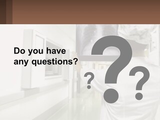 A Woman In A White Lab Coat Is Looking At A X - Ray PowerPoint Template