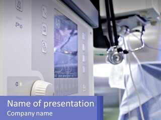 A Hospital Room With A Monitor And Medical Equipment PowerPoint Template