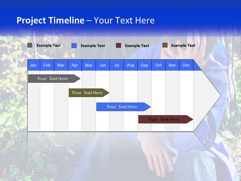 A Man In A Blue Jacket Sitting Next To A Tree PowerPoint Template