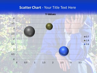 A Man In A Blue Jacket Sitting Next To A Tree PowerPoint Template