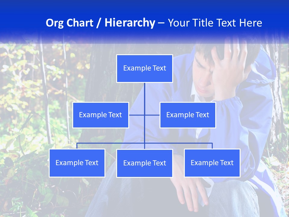 A Man In A Blue Jacket Sitting Next To A Tree PowerPoint Template