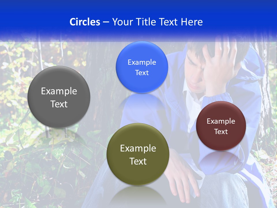 A Man In A Blue Jacket Sitting Next To A Tree PowerPoint Template