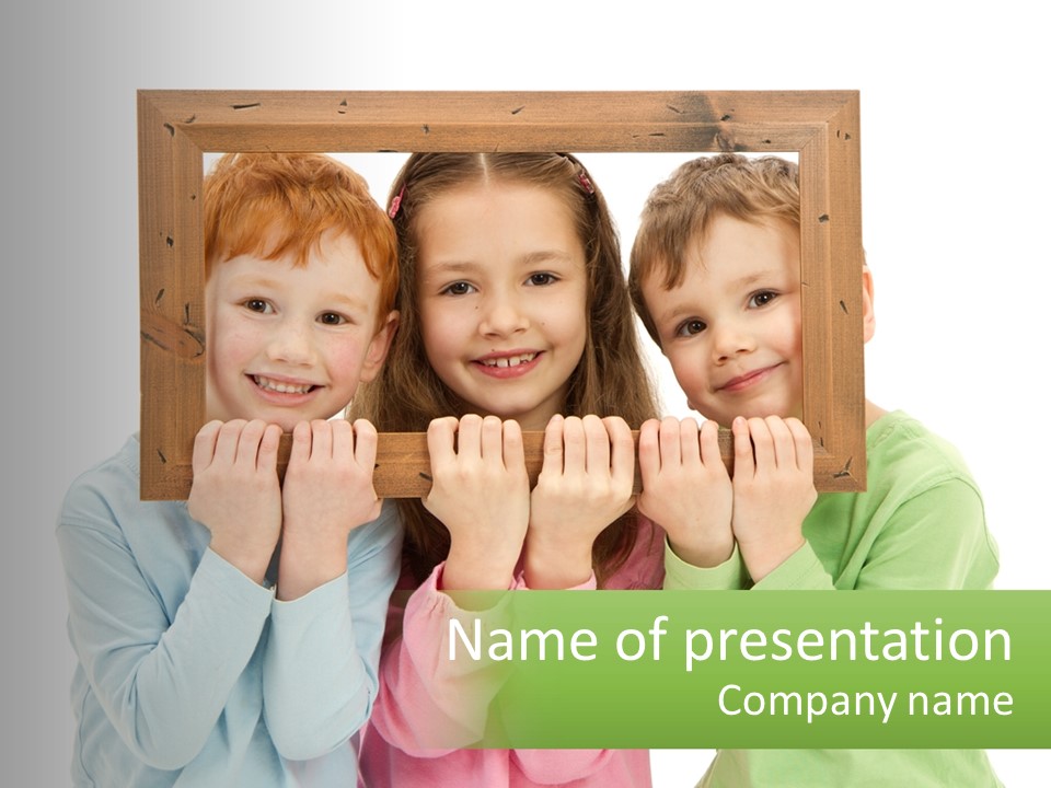 A Group Of Children Holding Up A Picture Frame PowerPoint Template