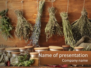 Herbs Are Hanging On A Wall In A Room PowerPoint Template