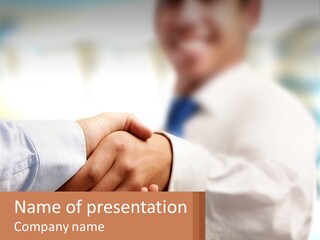 Two People Shaking Hands In Front Of A Blurry Background PowerPoint Template