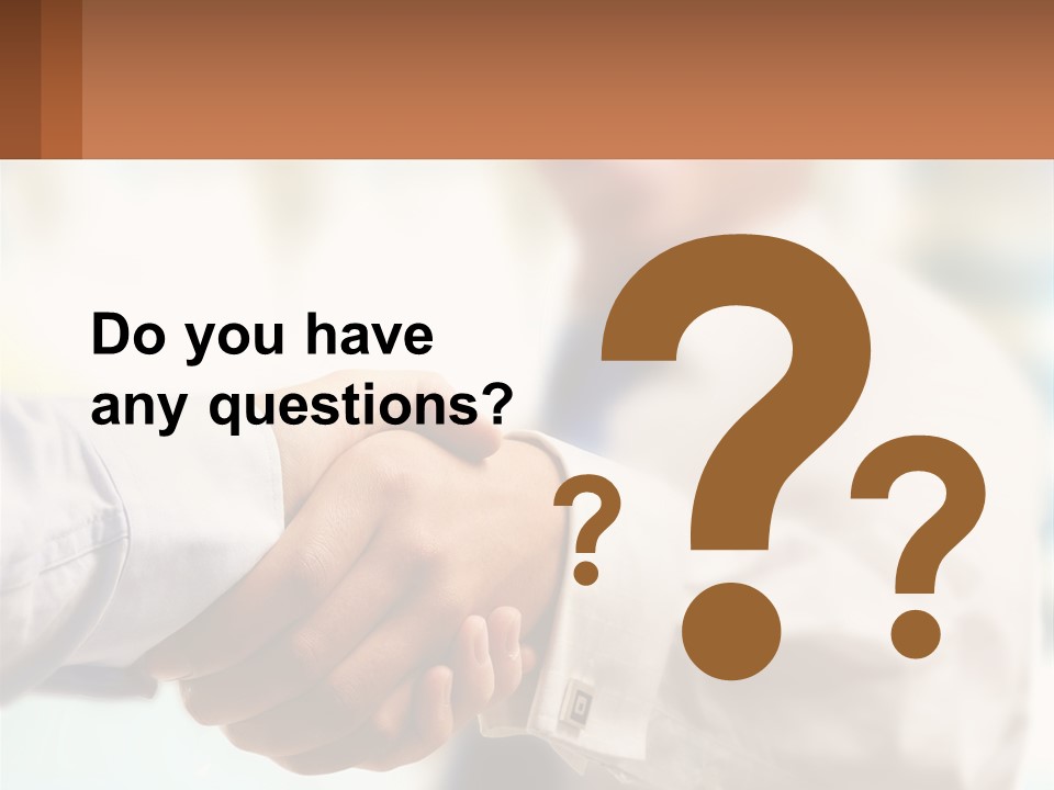 Two People Shaking Hands In Front Of A Blurry Background PowerPoint Template