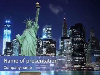 The Statue Of Liberty In New York City At Night PowerPoint Template