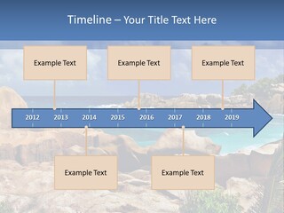 A Rocky Beach With Blue Water And White Clouds PowerPoint Template