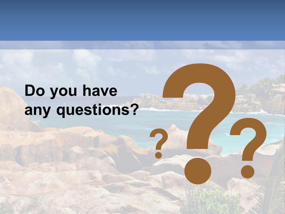 A Rocky Beach With Blue Water And White Clouds PowerPoint Template