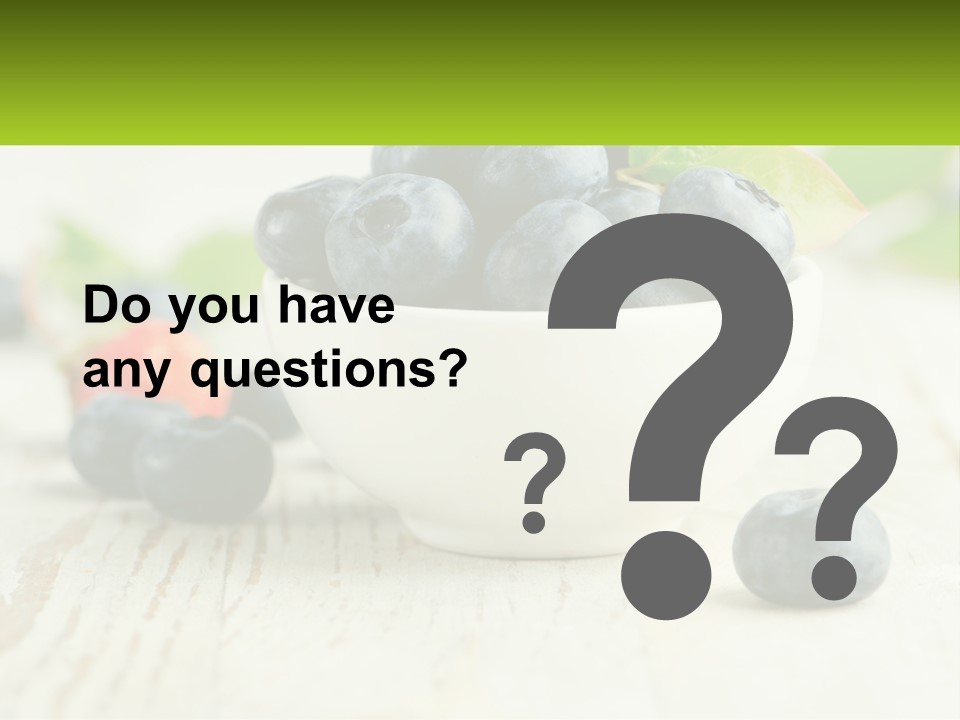 A White Bowl Filled With Blueberries On Top Of A Wooden Table PowerPoint Template