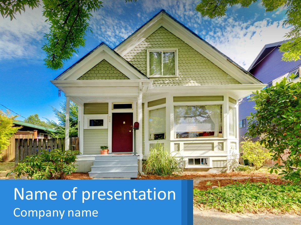 A House With A Blue Sign In Front Of It PowerPoint Template