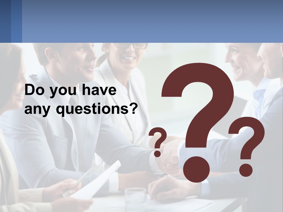 A Group Of Business People Shaking Hands Over A Table PowerPoint Template