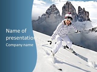 A Woman Skiing Down A Mountain With Mountains In The Background PowerPoint Template