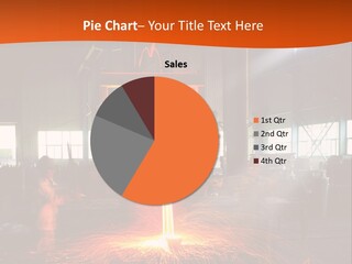 A Man Working On A Piece Of Metal In A Factory PowerPoint Template