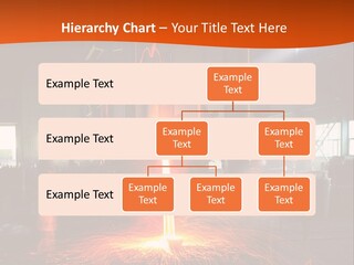 A Man Working On A Piece Of Metal In A Factory PowerPoint Template