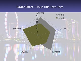 A Large Ferris Wheel In The Middle Of A City At Night PowerPoint Template