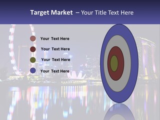 A Large Ferris Wheel In The Middle Of A City At Night PowerPoint Template