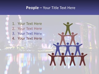 A Large Ferris Wheel In The Middle Of A City At Night PowerPoint Template